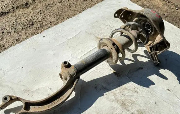 Front shock absorber with coil spring