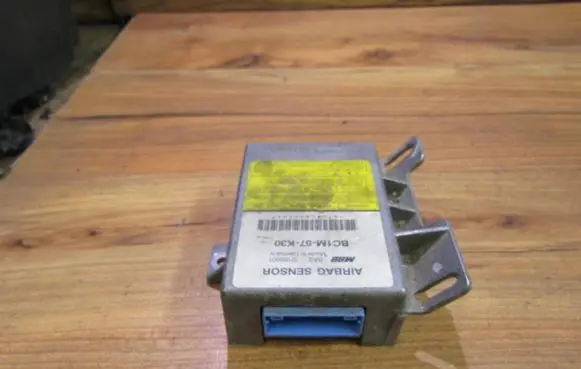 Mazda 323 Airbag control unit/module BC1M57K30