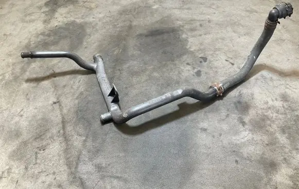 Volkswagen Golf VI Engine coolant pipe/hose 03L121065H