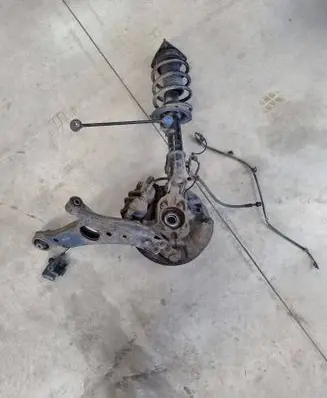 Front wheel hub spindle knuckle