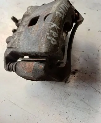 Nissan Juke I F15 Front brake caliper