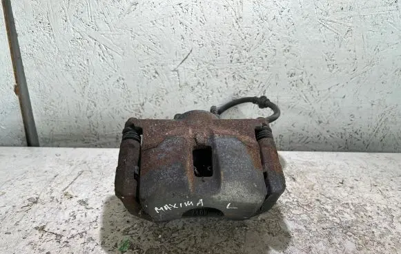 Nissan Maxima A35 Front brake caliper