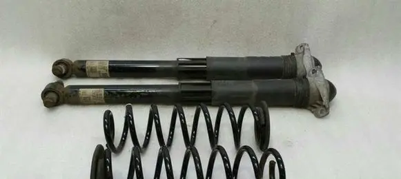 Volkswagen Golf VI Rear shock absorber with coil spring 5Q0512011GJ