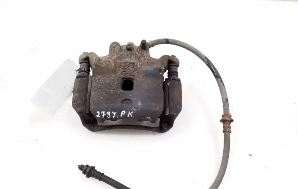 Nissan Juke I F15 Front brake caliper