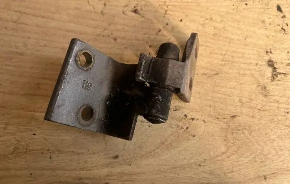 Front door lower hinge