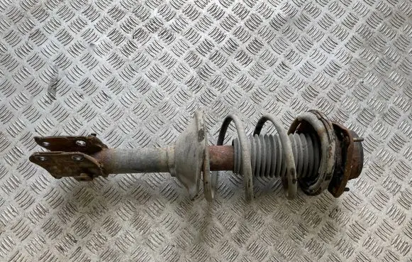 Subaru Forester SF Front shock absorber with coil spring