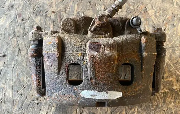 Ford Ranger Front brake caliper AB312B120AC