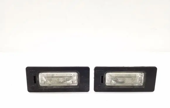 Volkswagen PASSAT B6 Number plate light 8T0943021