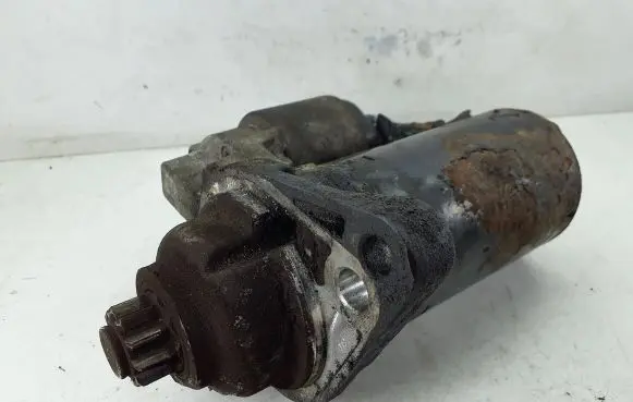 Volkswagen Touran I Starter motor 02Z911023F 0001123012