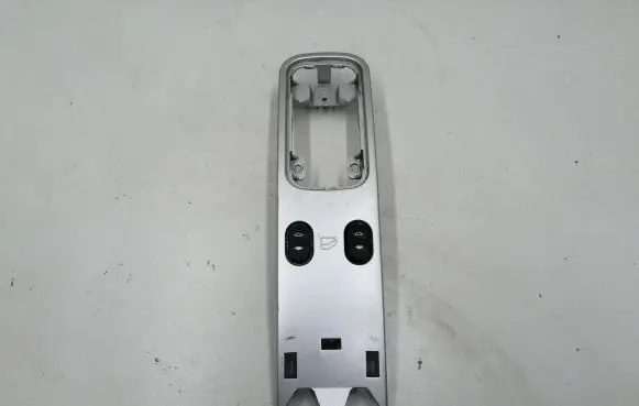 Think City Front door window switch trim 5724015