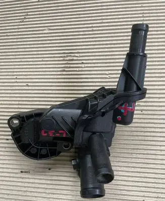 Thermostat/thermostat housing