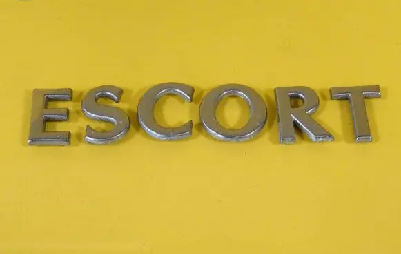 Ford Escort Manufacturers badge/model letters 