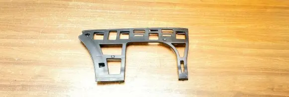Volkswagen Golf VI Bumper support mounting bracket corner 1K9807377