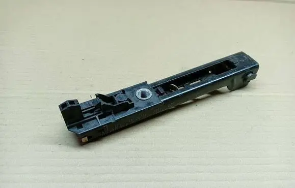 Volkswagen PASSAT B7 Seat belt adjustment rail 1T0857819B 2036603