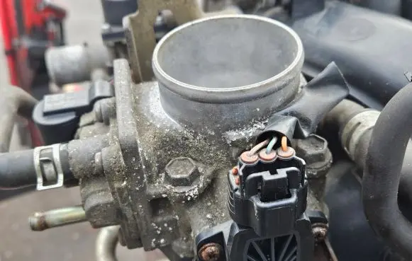 Suzuki Swift I Throttle valve 1813783E11