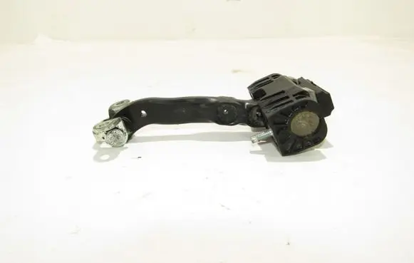 Front door check strap stopper