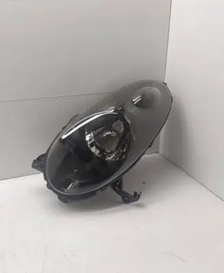 Nissan Micra Headlight/headlamp 89900070