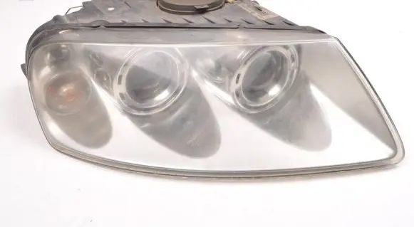 Volkswagen Touareg I Headlight/headlamp 7L6941016BK