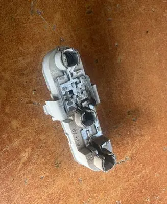 Volvo S40, V40 Tail light bulb cover holder