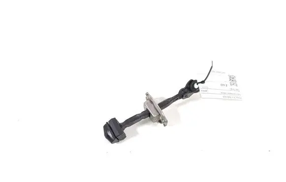 Front door check strap stopper