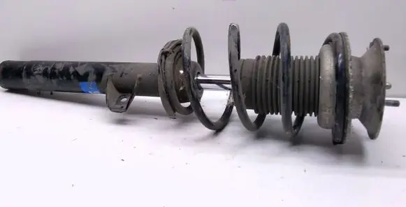 BMW 1 E81 E87 Front shock absorber with coil spring 878118