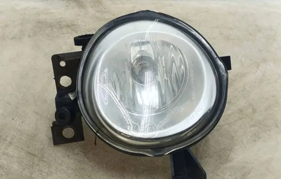 Volkswagen Touareg I Front fog light 7L6941700E 89202281