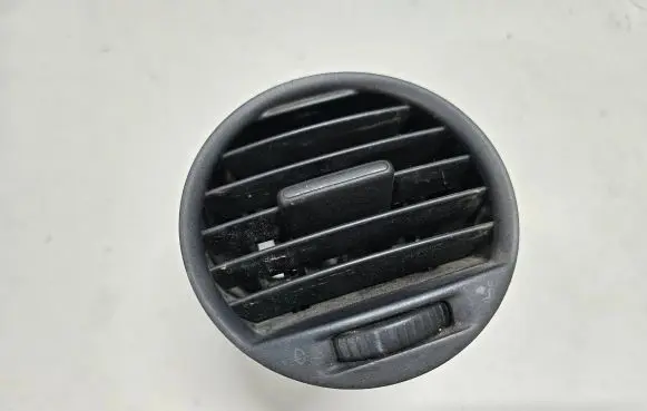 Volkswagen Caddy Dash center air vent grill 2K0819703B