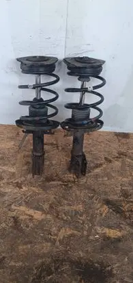 Renault Megane III Front shock absorber with coil spring