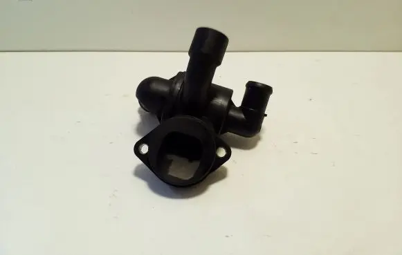 Thermostat/thermostat housing
