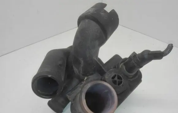 Thermostat/thermostat housing