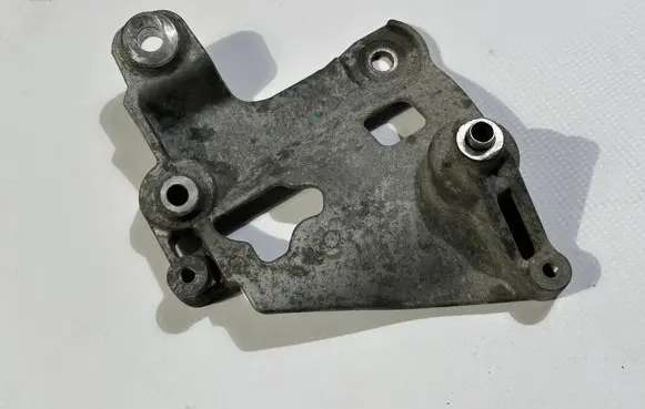 Lincoln Continental A/C compressor mount bracket F2GE-8D611-BA