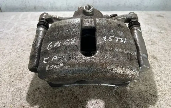 Volkswagen Golf VII Front brake caliper