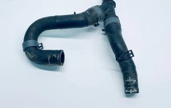 Volkswagen Golf VII Engine coolant pipe/hose 5Q0122051BD 1K0121087Q