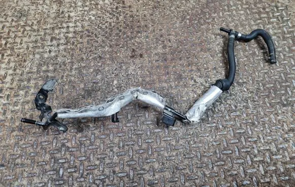Volkswagen Golf VII Engine coolant pipe/hose 5Q0122447AS 04L121070D