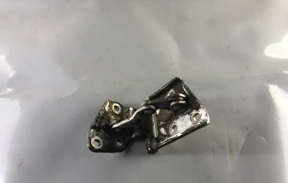 Front door lower hinge