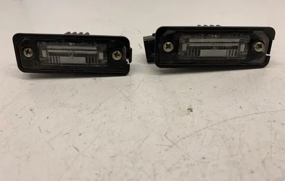 Volkswagen Golf V Number plate light 1J6943021B