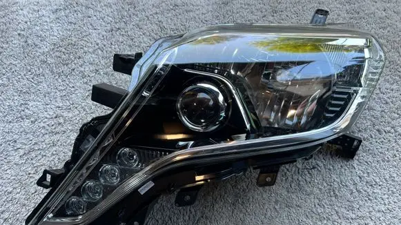 Toyota Land Cruiser (J150) Headlight/headlamp 8114560J20