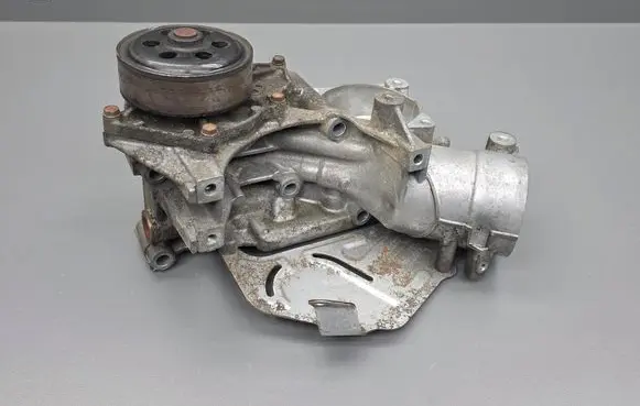 Oil filter mounting bracket
