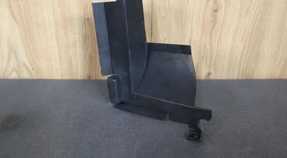 Engine bonnet/hood lock trim molding