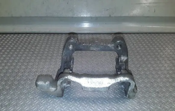Volkswagen Caddy Brake caliper pad carrier rear 