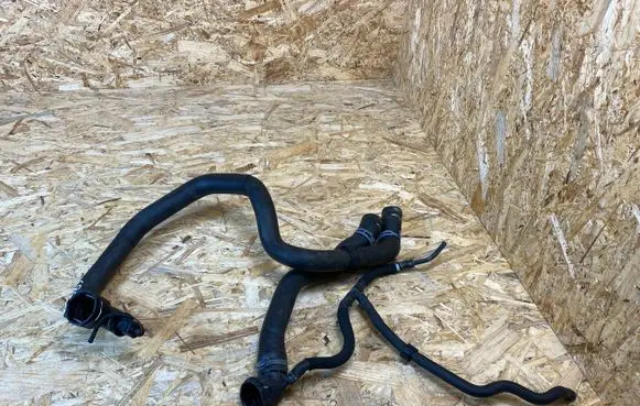 Volkswagen Golf VII Engine coolant pipe/hose 5Q0121049AC