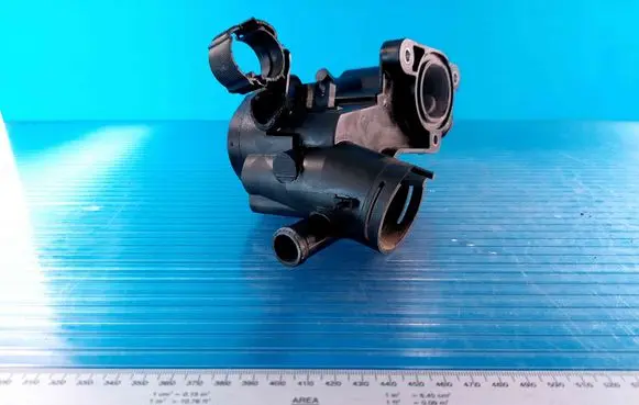 Thermostat/thermostat housing