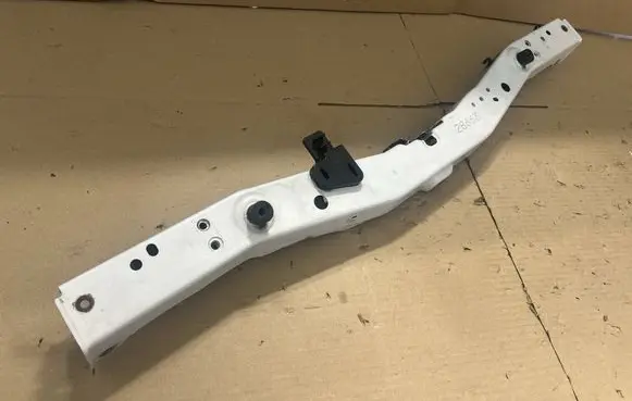 Top upper radiator support slam panel