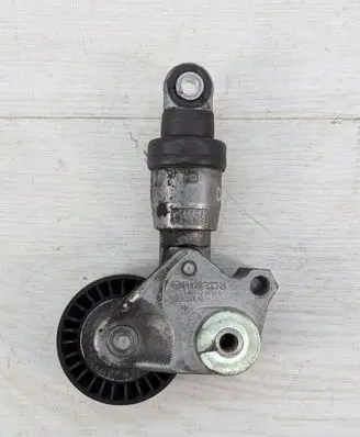 Mazda CX-5 Generator/alternator belt tensioner PE0315980