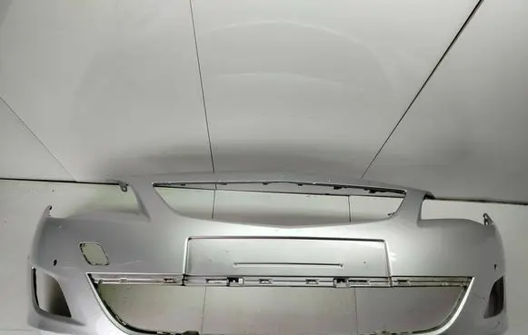 Opel Astra J Front bumper 13264403