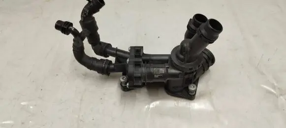 Thermostat/thermostat housing