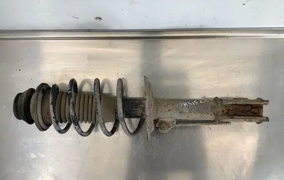 Toyota Yaris Front shock absorber with coil spring 