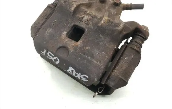 Nissan Juke I F15 Front brake caliper