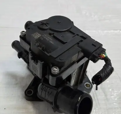 Thermostat/thermostat housing