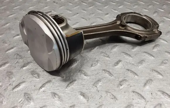 Piston with connecting rod